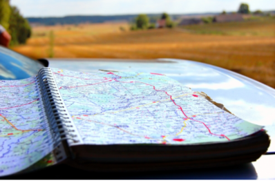 Renting a car in Morocco for a scenic road trip with DL CARS, showcasing top destinations like the Sahara Desert, Marrakech, and Atlas Mountains.