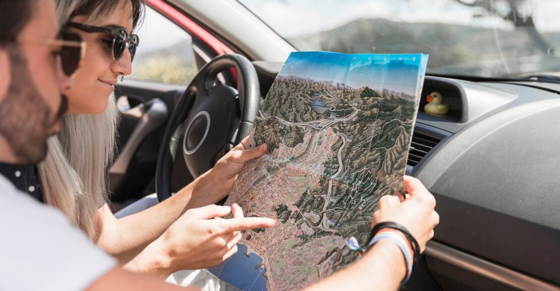 Morocco road trip with DL CARS rental car driving through scenic Atlas Mountains