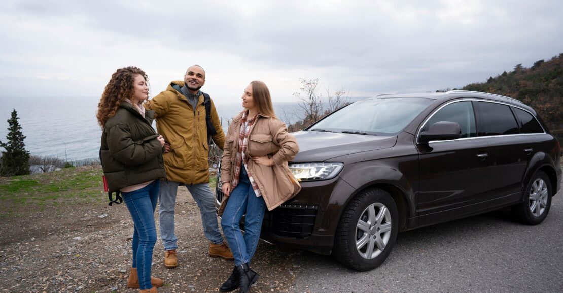 Family traveling in a comfortable SUV rental through Morocco’s scenic landscapes.