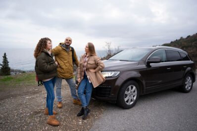 Family traveling in a comfortable SUV rental through Morocco’s scenic landscapes.