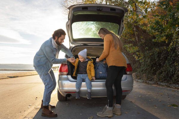 Happy family traveling through Morocco in a spacious DL Cars rental SUV